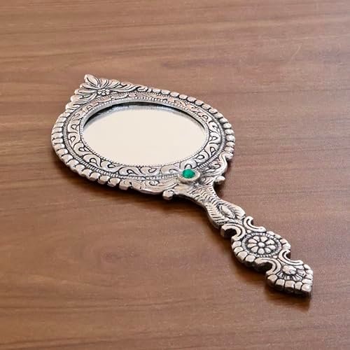 KridayKraft Beautifully Carved Round Shape Silver Plating Hand Mirror for Makeup, Travelling, Salon Mirror & Decorative Mirror Antique Item for Wedding Gifts. KridayKraft Beautifully Carved Round Shape Silver Plating Hand Mirror for Makeup, Travelling, Salon Mirror & Decorative Mirror Antique Item for Wedding Gifts.
